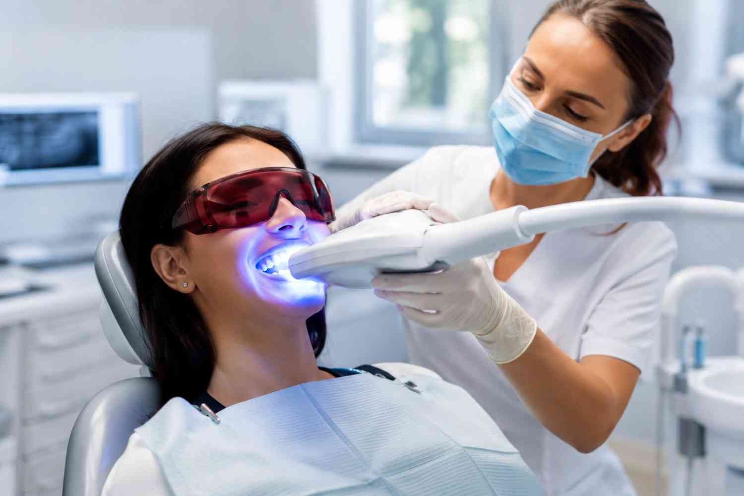Professional teeth whitening treatment for a brighter white smile