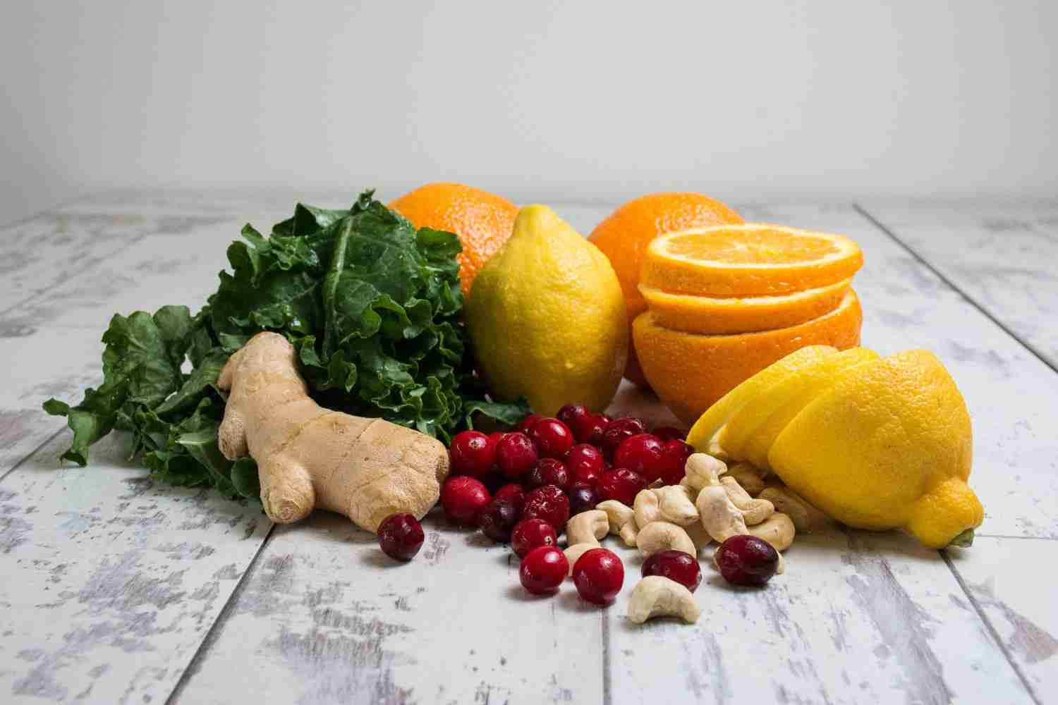 Nutritious ingredients including berries, lemon, mint, and cinnamon for gelatin recipes
