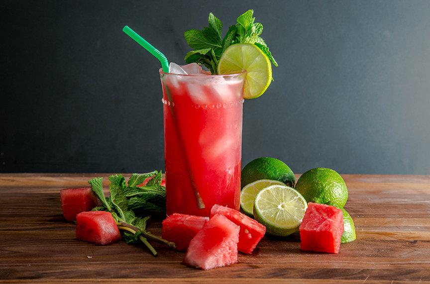 Watermelon and mint juice with fresh watermelon cubes and lime.